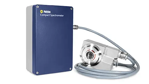 Polytec compact spectrometer PCS with sensor head measuring a product inline at a single measurement point