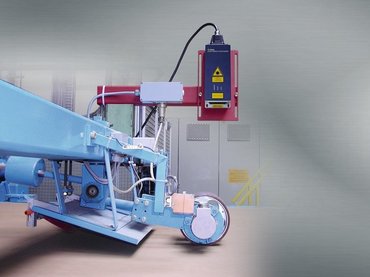 Cut-to-length control on corrugated board
