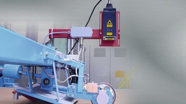Cut-to-length control on corrugated board