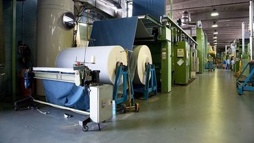 Length measurement of coiled sheet material Length measurement of coiled sheet material