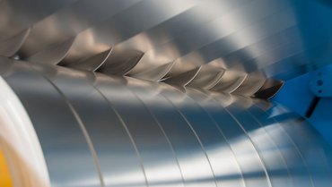 Non-contact speed and length measurement on a slitting line